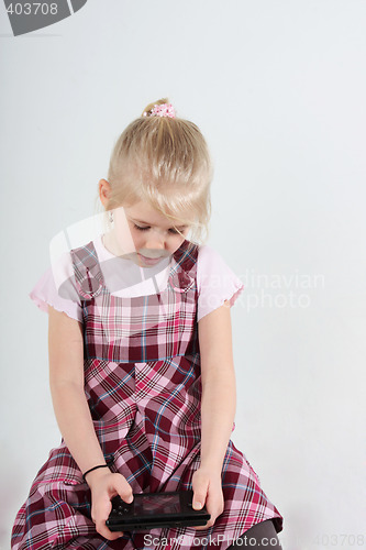 Image of girl playing video game