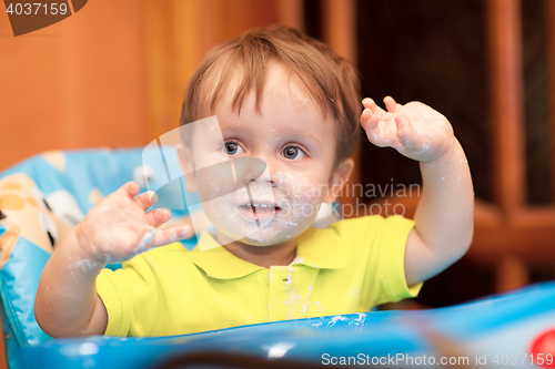 Image of Happy little boy with face got dirty