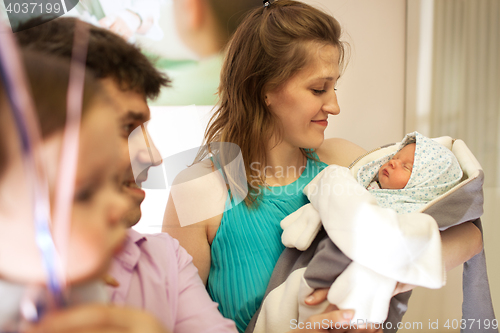 Image of Family in the maternity hospital with infant