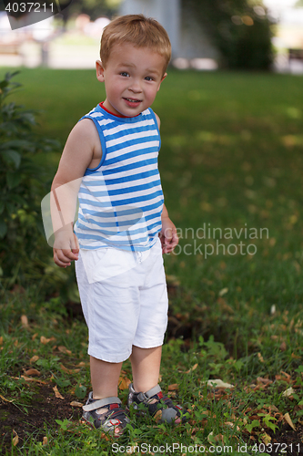 Image of Portrait of smiling three year-old boy