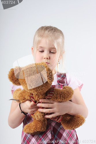 Image of Small girl and teddy