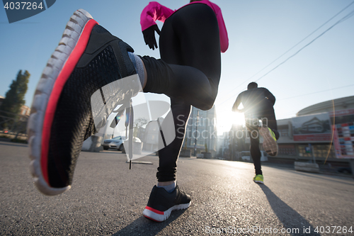 Image of young  couple jogging