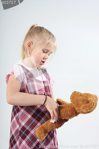 Image of Girl and her teddy bear