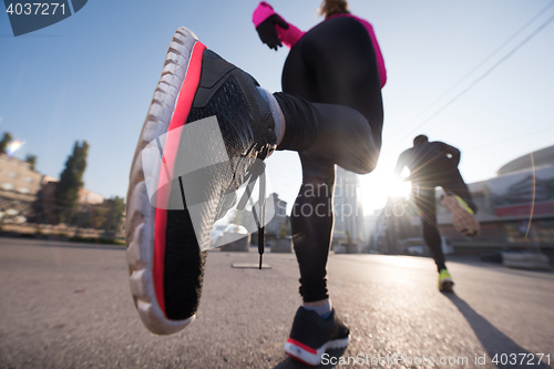 Image of young  couple jogging