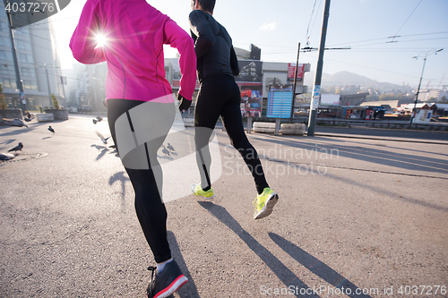 Image of young  couple jogging