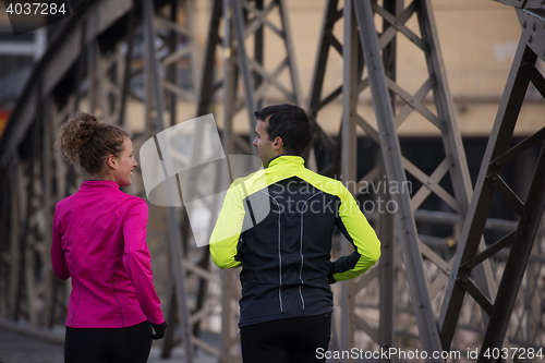 Image of young  couple jogging