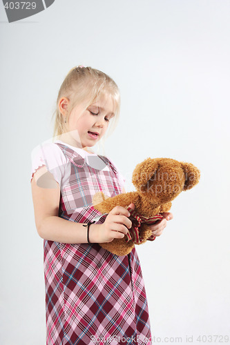 Image of Girl with teddy bear