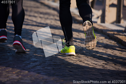 Image of young  couple jogging