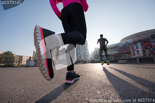 Image of young  couple jogging