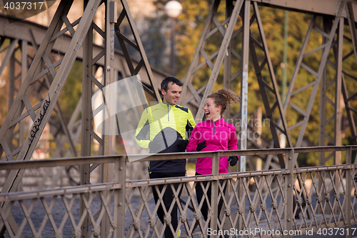 Image of young  couple jogging