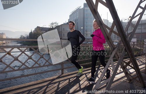 Image of young  couple jogging