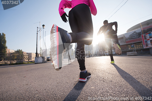 Image of young  couple jogging