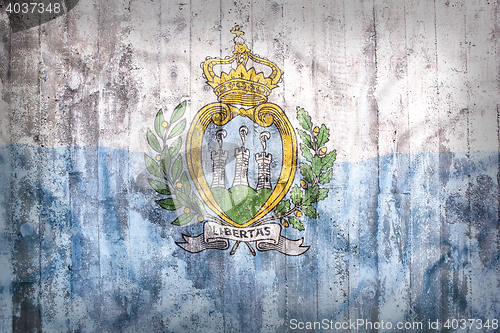 Image of Grunge style of San Marino flag on a brick wall