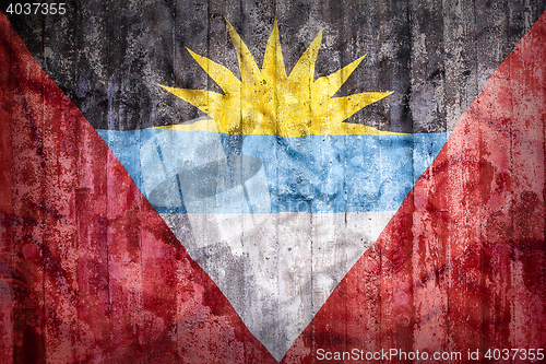 Image of Grunge style of Antigua and Barbuda flag on a brick wall  