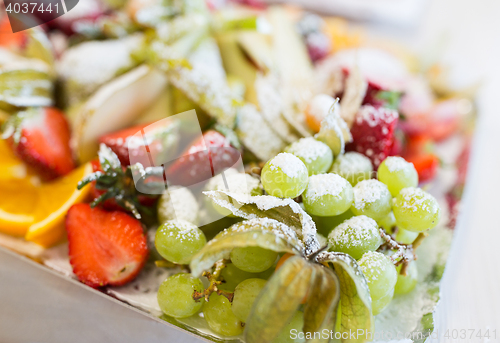 Image of close up of dish with sugared fruit dessert