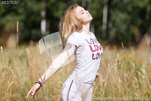 Image of Young beautiful girl in love