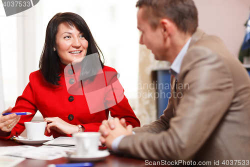 Image of Businesswoman in a meeting with a colleague