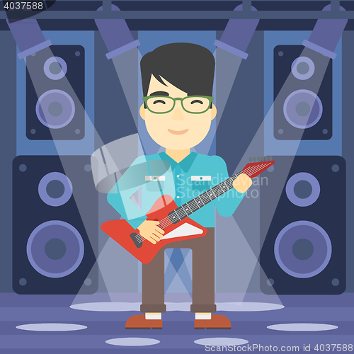 Image of Musician playing electric guitar.