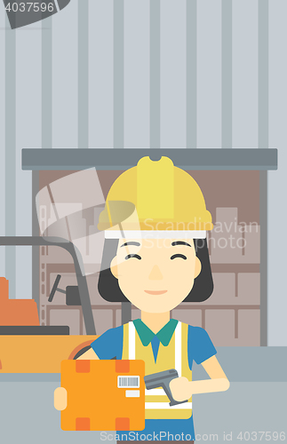 Image of Warehouse worker scanning barcode on box.