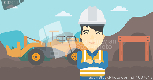 Image of Miner with mining equipment on background.