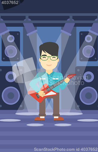 Image of Musician playing electric guitar.