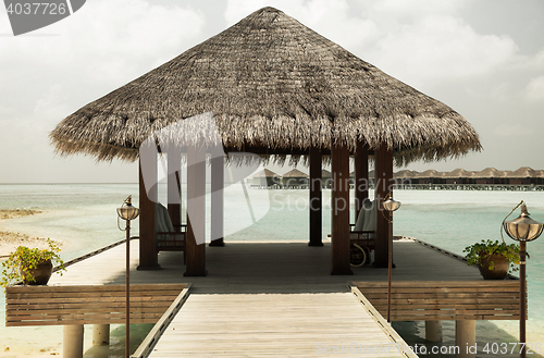 Image of patio or terrace with canopy on beach sea shore