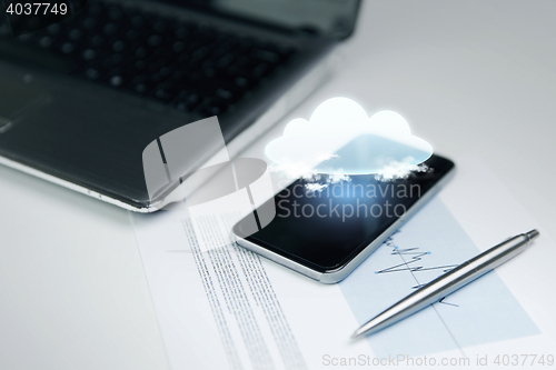 Image of close up of smartphone with cloud icon projection