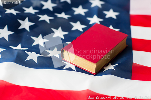 Image of close up of american flag and book