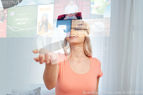 Image of woman in virtual reality headset or 3d glasses