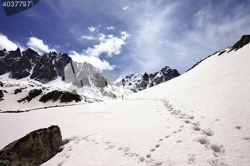 Image of Snow mountain in sun spring day