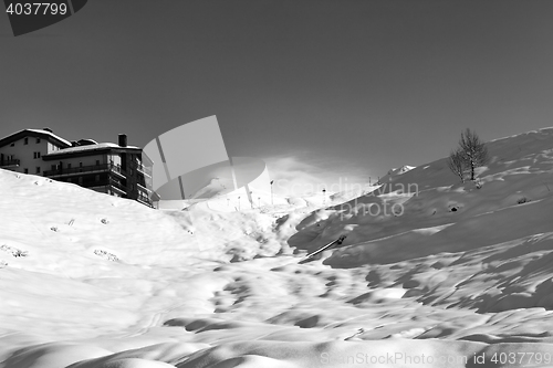 Image of Black and white view on off-piste slope and hotel in winter moun