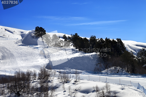 Image of Ski slope in sun day