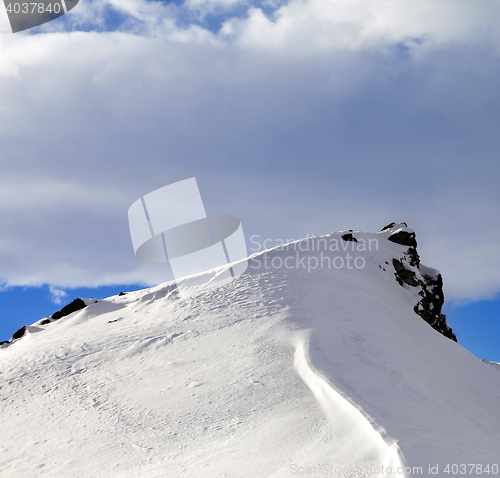 Image of Top of mountains with snow cornice after snowfall