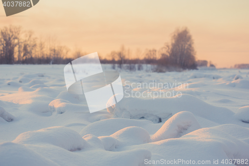 Image of landscape. weather, snowdrifts in the foreground