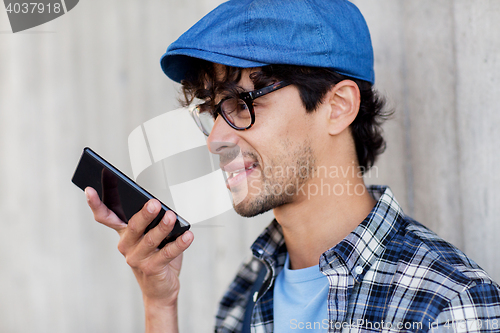 Image of man using voice command or calling on smartphone