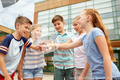 Image of group of happy elementary school students