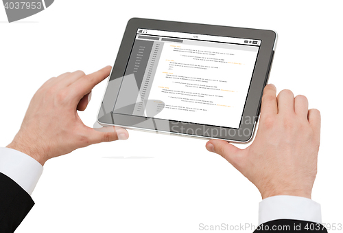 Image of close up of hands holding tablet pc with coding