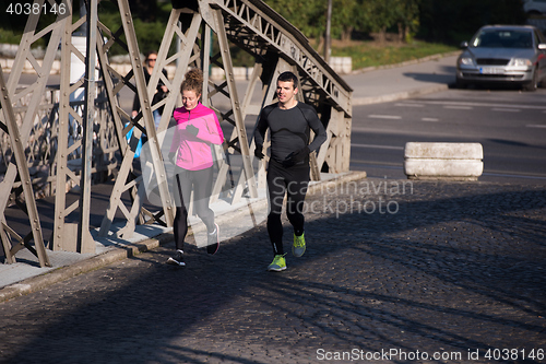 Image of young  couple jogging