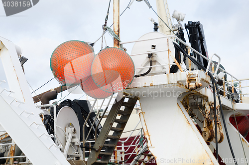 Image of three big float on big fishingboat