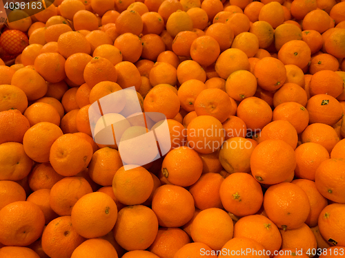 Image of one box with a lot of small citrus