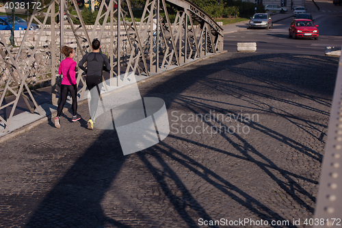 Image of young  couple jogging