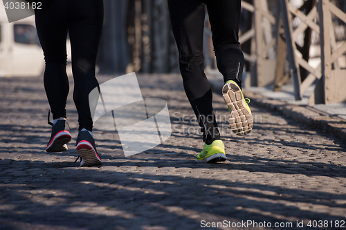 Image of young  couple jogging
