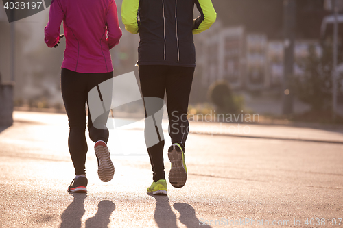 Image of young  couple jogging