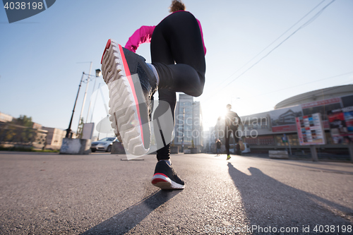 Image of young  couple jogging