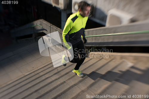 Image of man jogging on steps