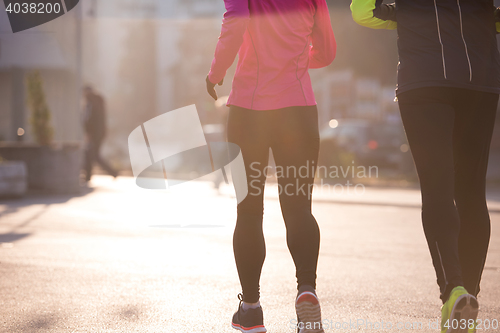 Image of young  couple jogging