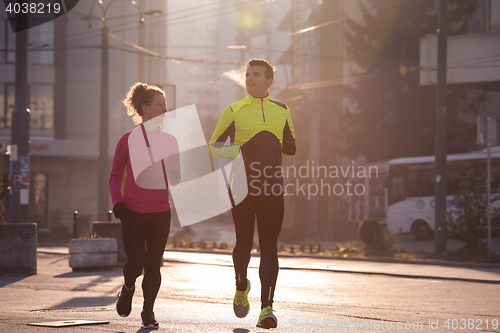 Image of young  couple jogging