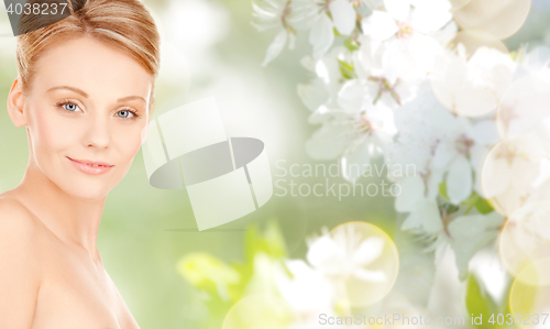 Image of beautiful young woman face over white background