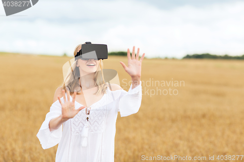 Image of woman in virtual reality headset on cereal field