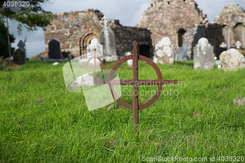 Image of old grave cross on celtic cemetery in ireland